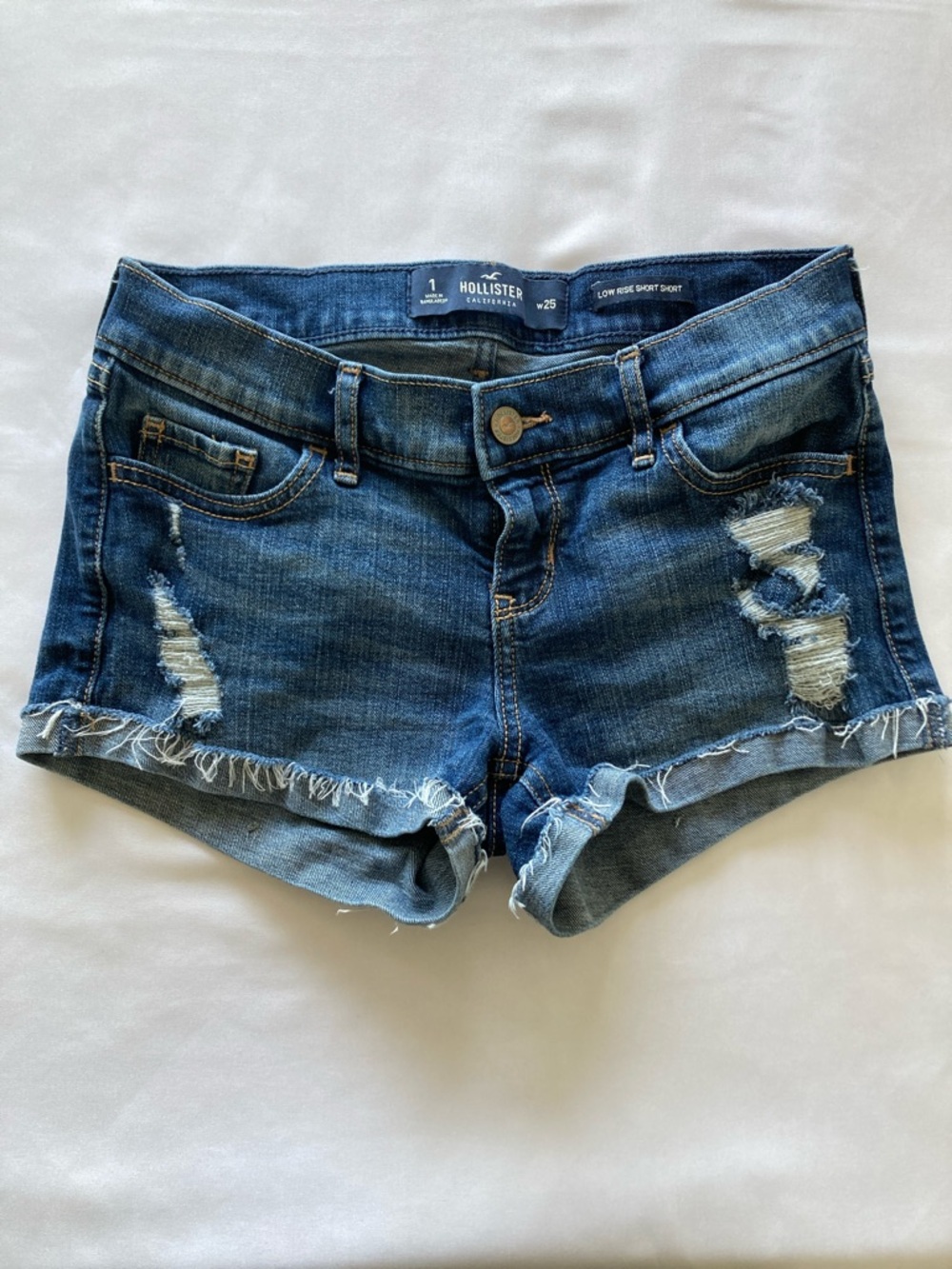 Hollister Women’s Indigo Low Rise Ripped Denim Cutoff Short Shorts Sz- 1/w25